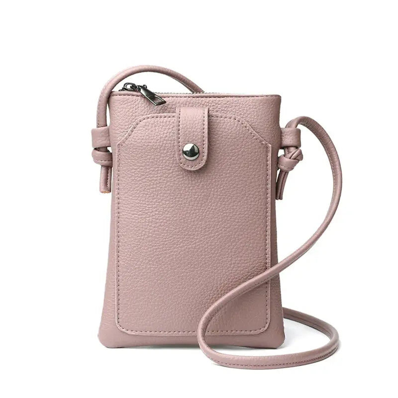 Crossbody bag by Simples Market in rose pink PU leather; mini phone-wallet with buckle.