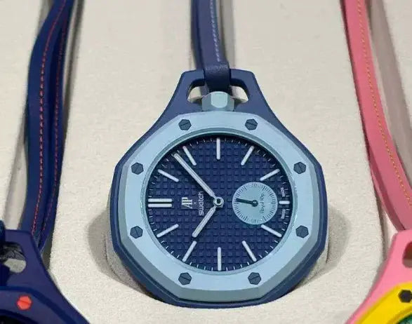 AP Swatch Joint Watch quartz with logo; blue dial, light-blue octagonal bezel, blue strap