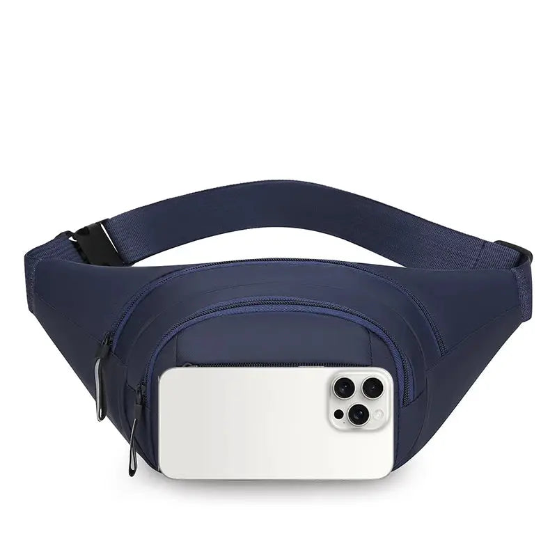 Navy blue men's waist pack with adjustable strap and front zip pocket; smartphone shown for scale.