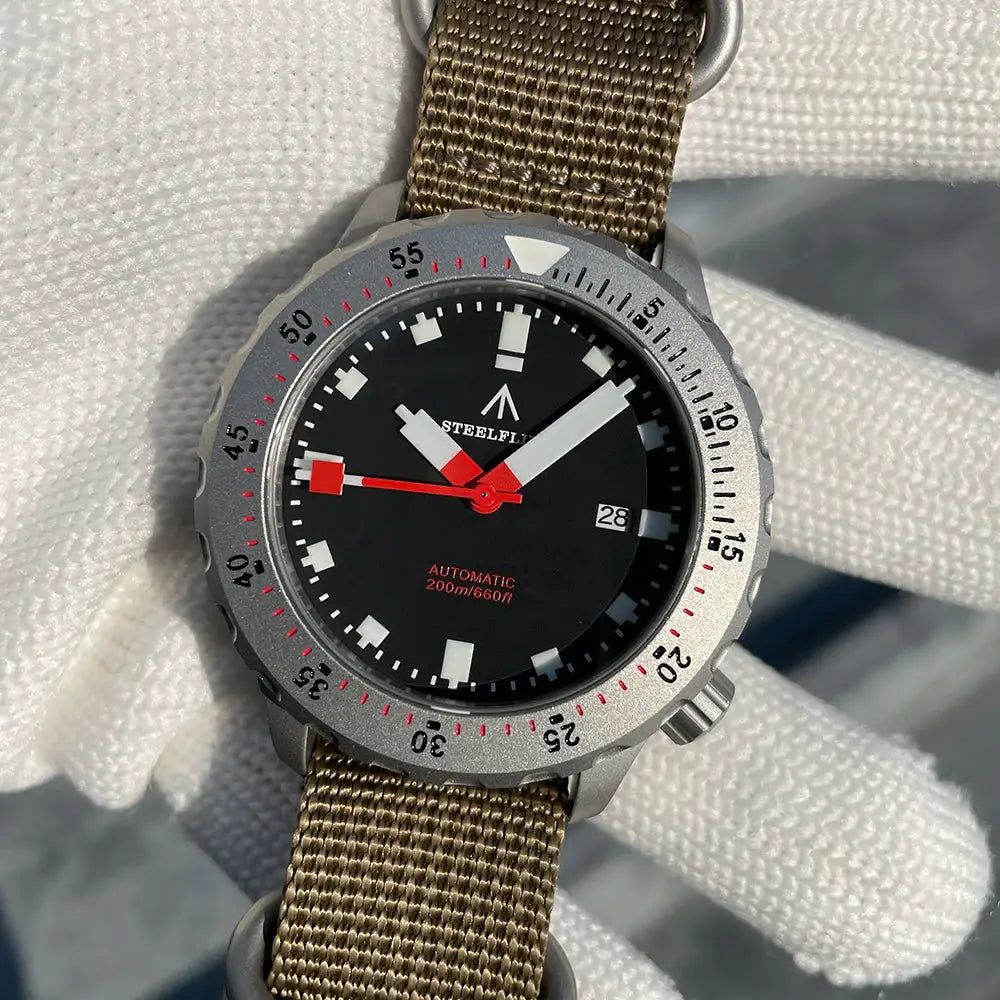 Steelflier SF752 automatic dive watch with black dial, red hands, gray bezel, khaki NATO strap, 200m water resistant
