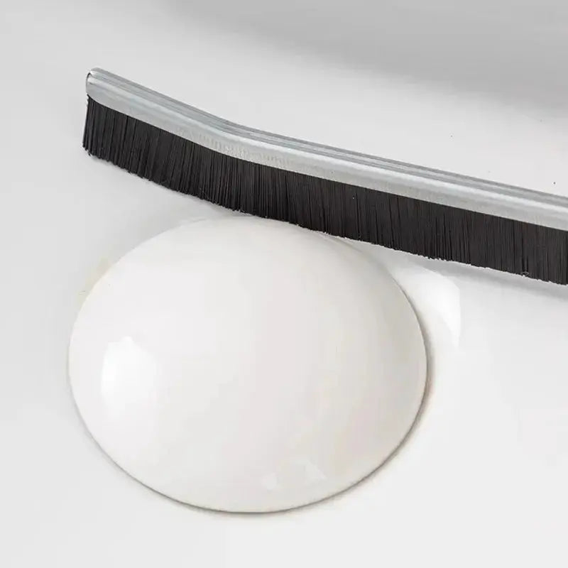 Grout cleaning brush by Simples Market with hard black bristles for tile joints and shower grout