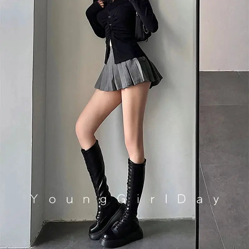 Pleated skirt with attached shorts, gray high-waist A-line mini skirt, paired with knee-high black boots