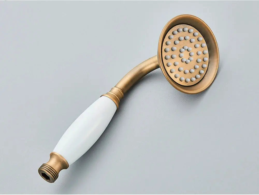 Simples Market antique brass handheld shower head with white ceramic handle and brass connector