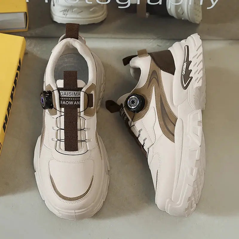Pair of men's high-top running shoes, white/beige with brown accents and GAISIMA dial lacing, thick soles.