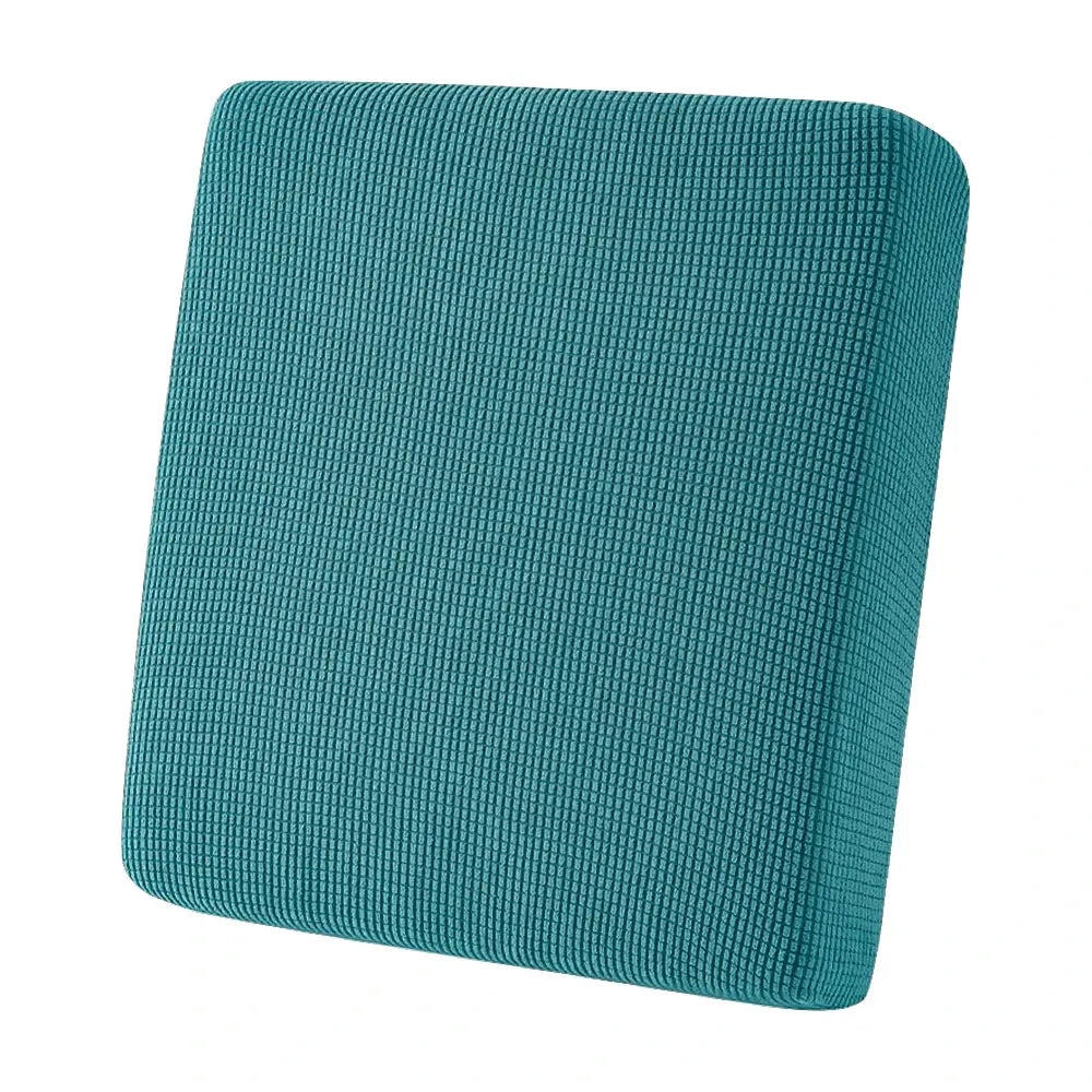 Patio sofa cushion cover in teal waffle-pattern jacquard fabric for outdoor stretch fit