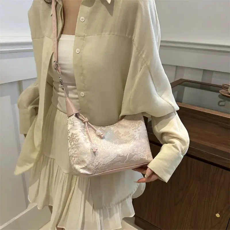 Handbag light pink Chinese-style embroidered ladies bag with floral pattern and crossbody strap
