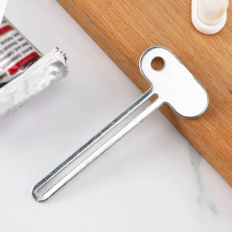 Stainless Steel Toothpaste Squeezer and Rotating Dispenser for Hair Oil Paint Ointments Cosmetics Bathroom Accessories