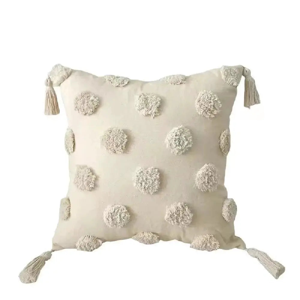 Bohemian ivory cushion cover with pom-pom embroidery and tassel corners