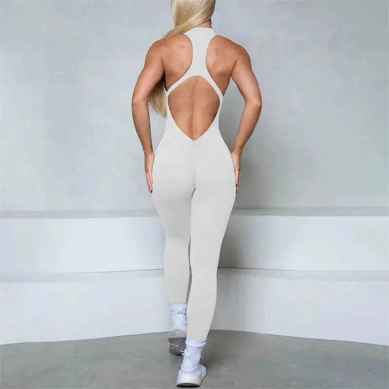 Women's white sleeveless zipper scrunch-butt jumpsuit for gym and yoga; back-cutout design