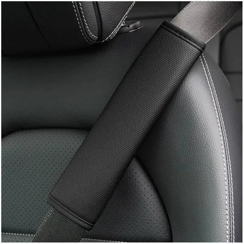 Car seat belt shoulder cover, black PU leather with embossed texture, Simples Market.