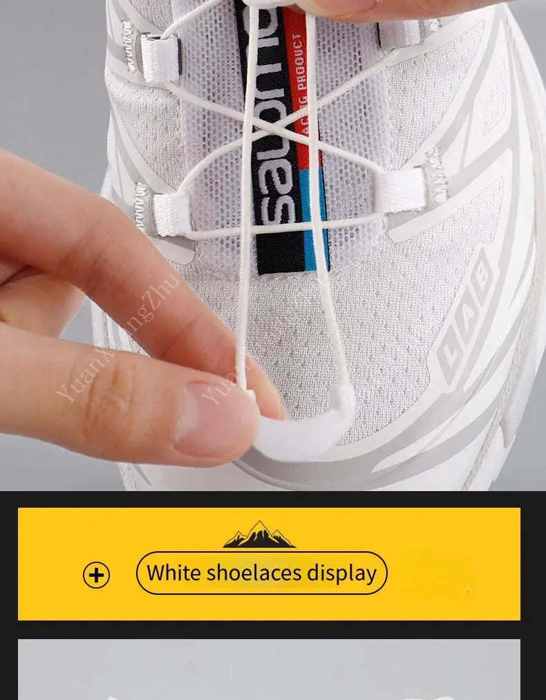 White no-tie round shoelaces for running sneakers displayed on a white-gray athletic shoe