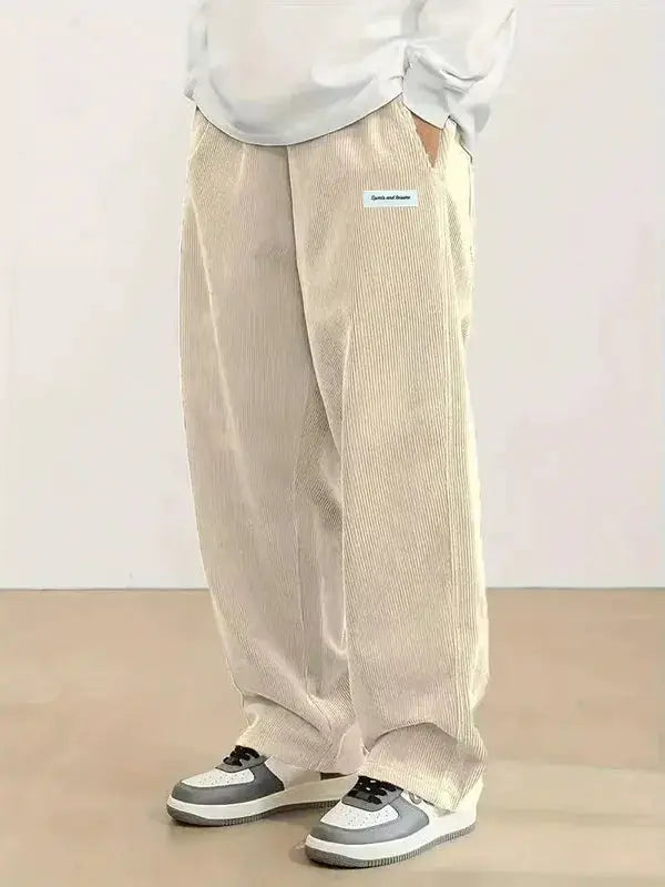 Men's beige corduroy casual pants with loose straight fit, elastic waist and drawstring