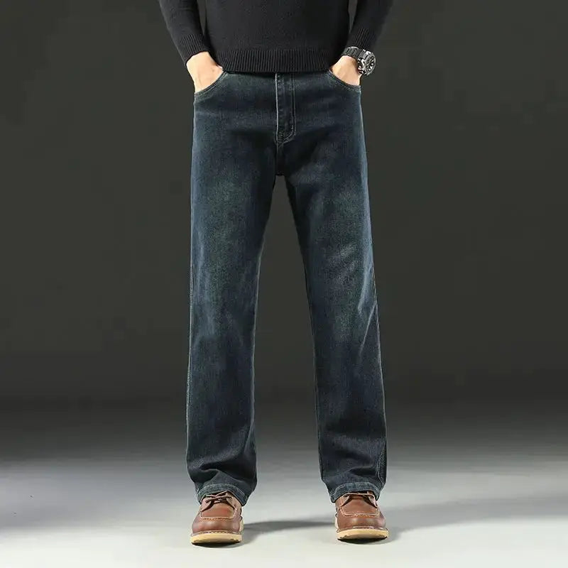 Men's baggy dark denim jeans with a wide-leg, straight-stretch fit
