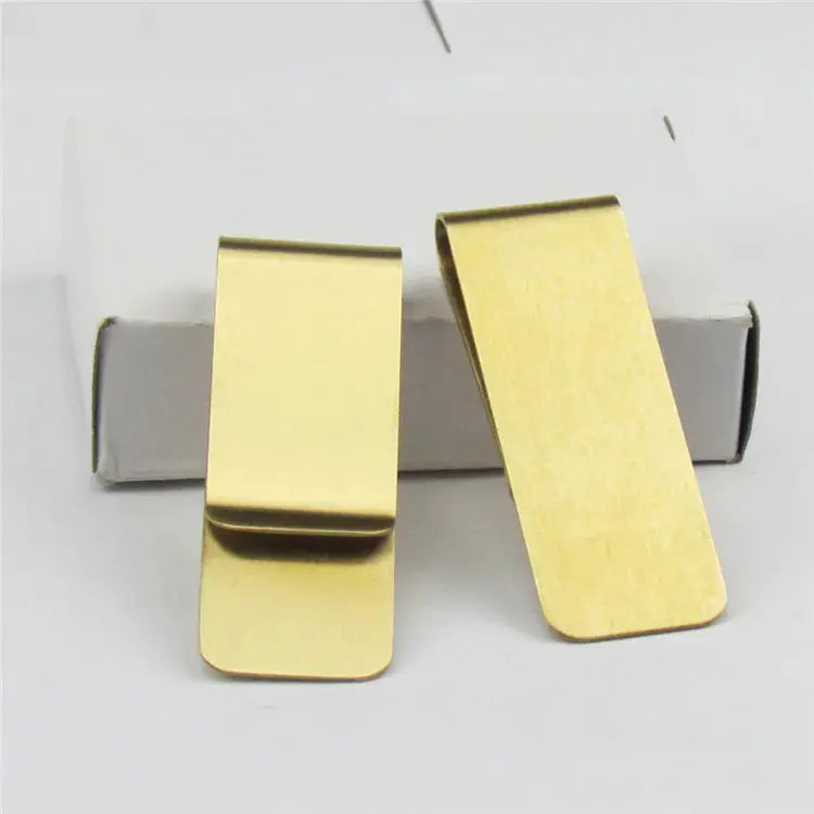 Two gold-tone money clips by Simples Market; gold-tone cash clips set