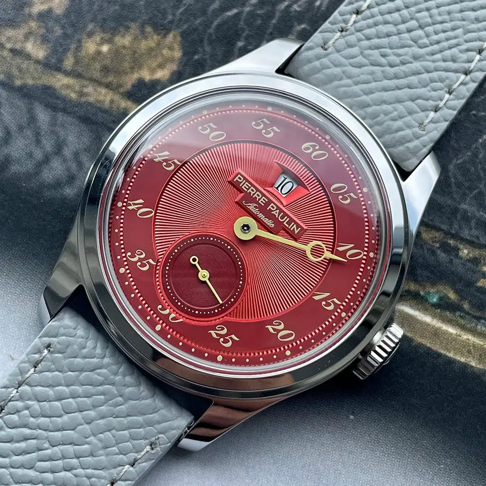 Pierre Paulin Jumping Hour men's watch with salmon dial, date window, automatic movement, 38mm case, gray leather strap