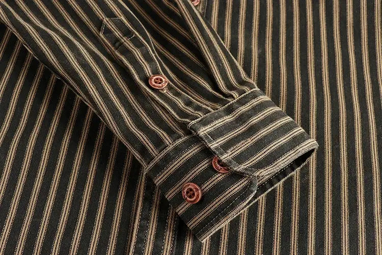 Simples Market men's striped long-sleeve shirt cuff close-up, dark base with tan vertical stripes and brown buttons