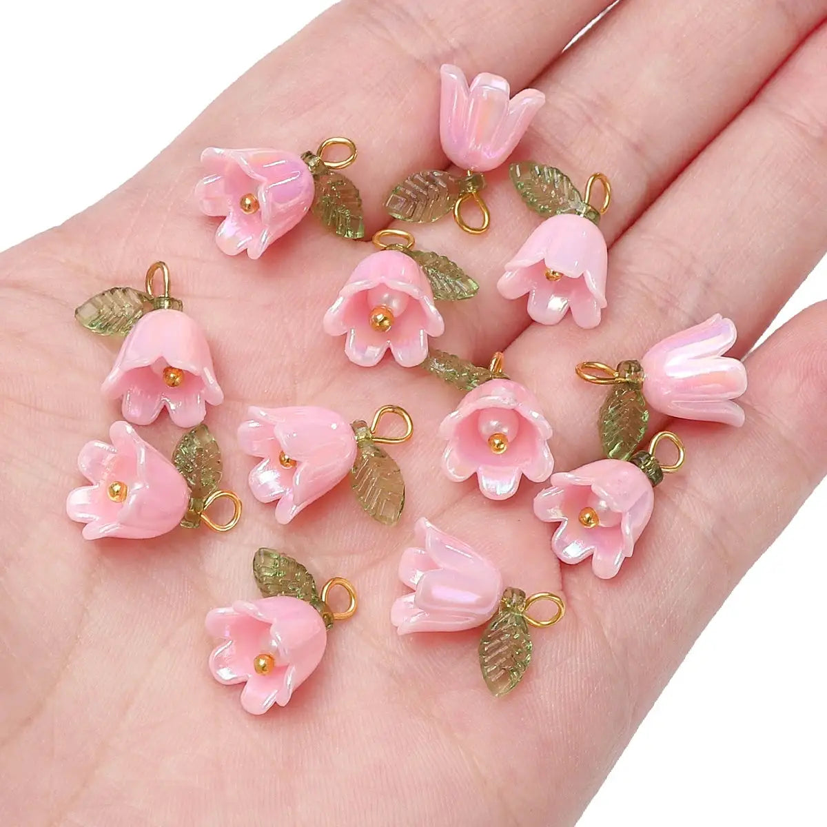 Pink acrylic lily-of-the-valley flower beads with green leaves and gold loop, 11x14mm, 2–10 pcs, Simples Market