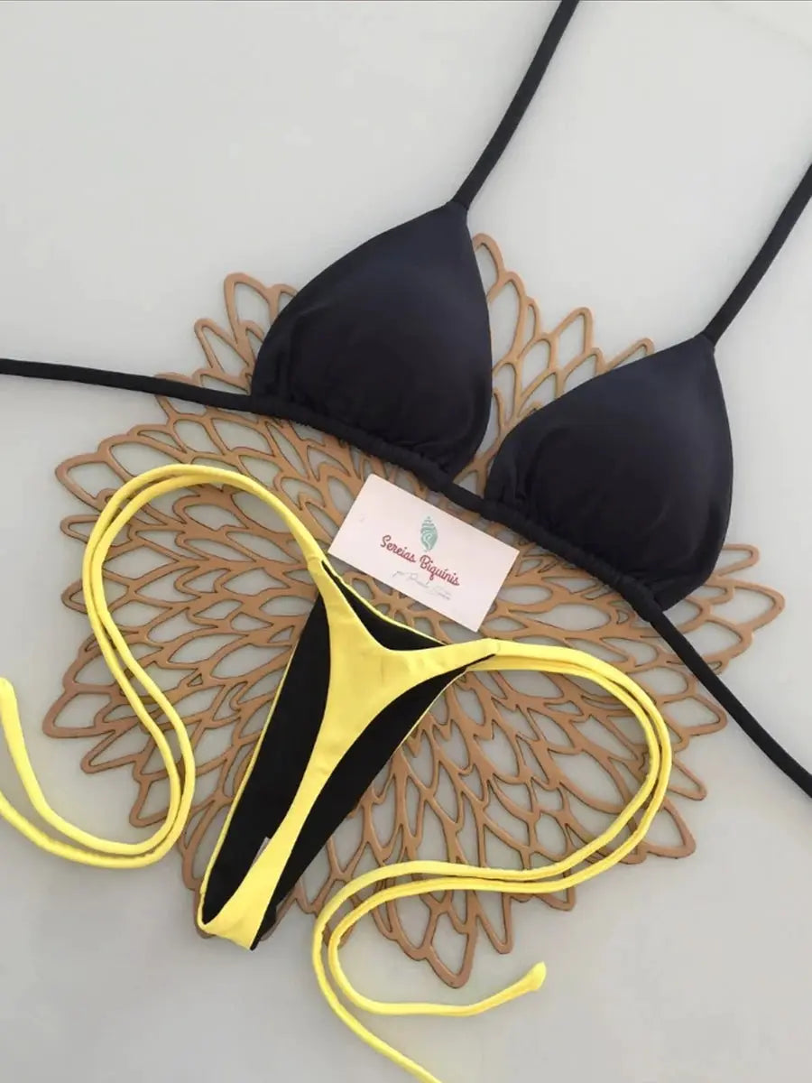 Simples Market two-piece bikini set: black triangle halter top with neon yellow/black color-block thong bottoms