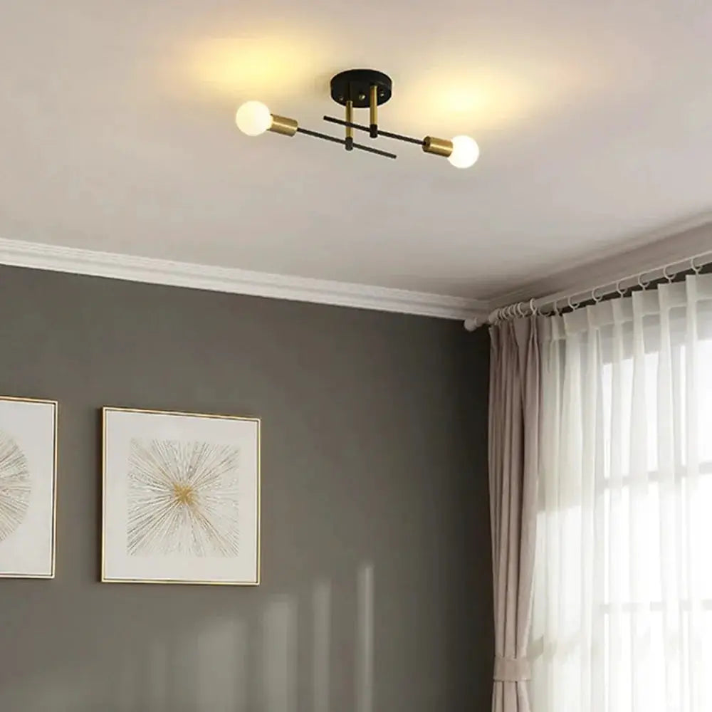 Vintage E27 ceiling light fixture with dual heads in black and gold