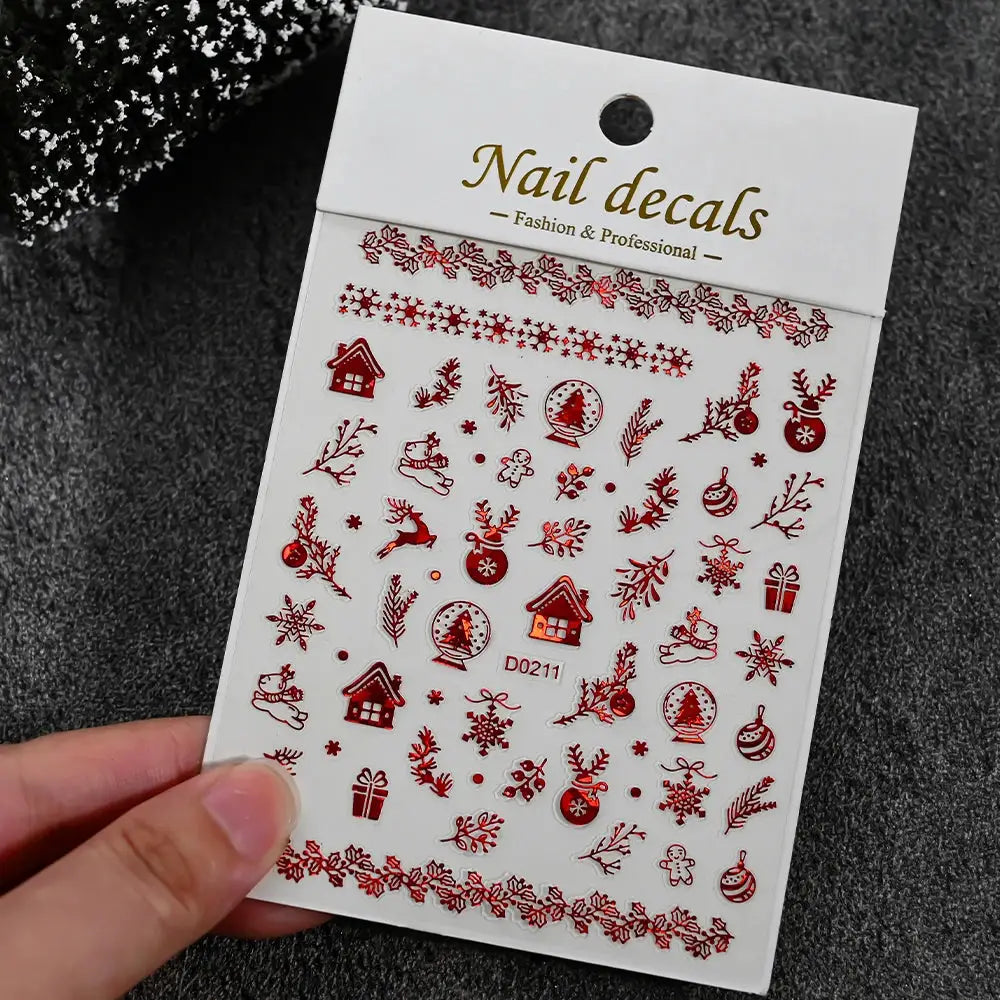 Nail decals sheet by Simples Market in red and white Christmas designs (snowmen, snowflakes, houses)