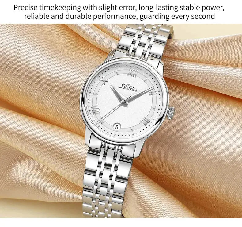 ADDIES luxury women's watch on a silver stainless steel bracelet with white dial and date window