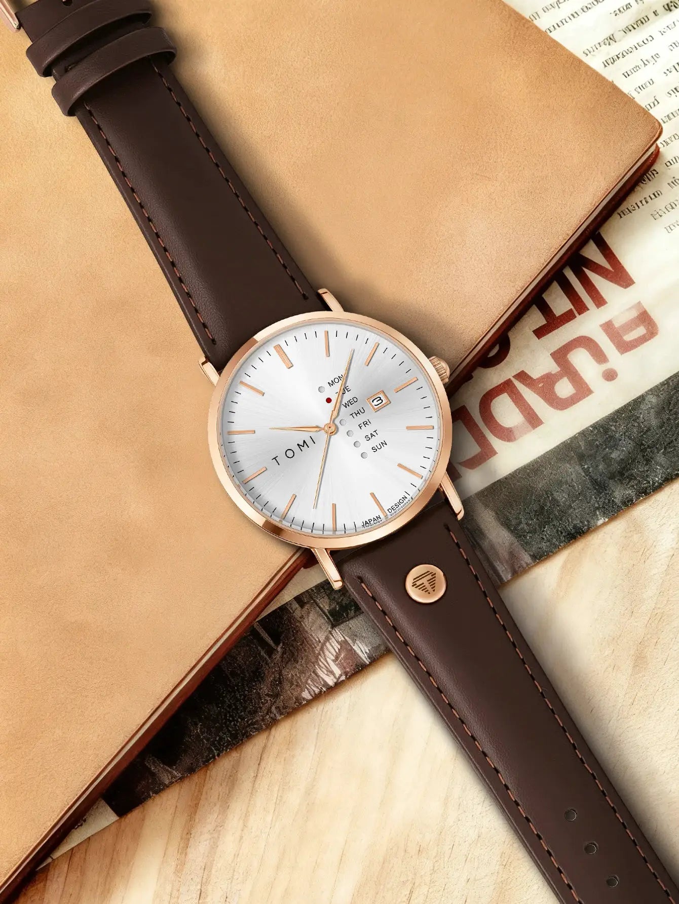 TOMI Trendy men's quartz watch with brown leather strap, rose-gold case, and weekday calendar