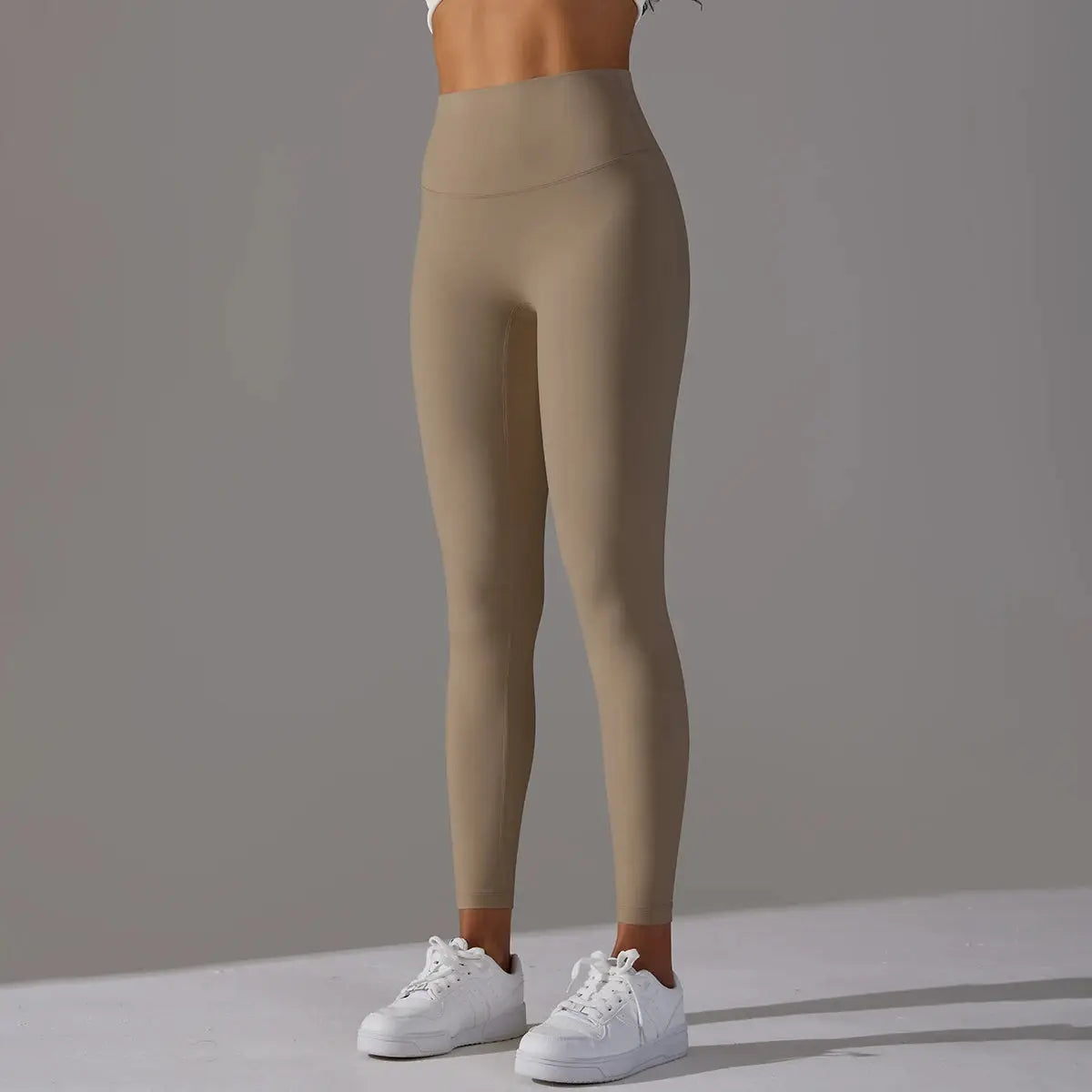 High-waist nude leggings for women, fitness/yoga, full-length tight fit with white sneakers