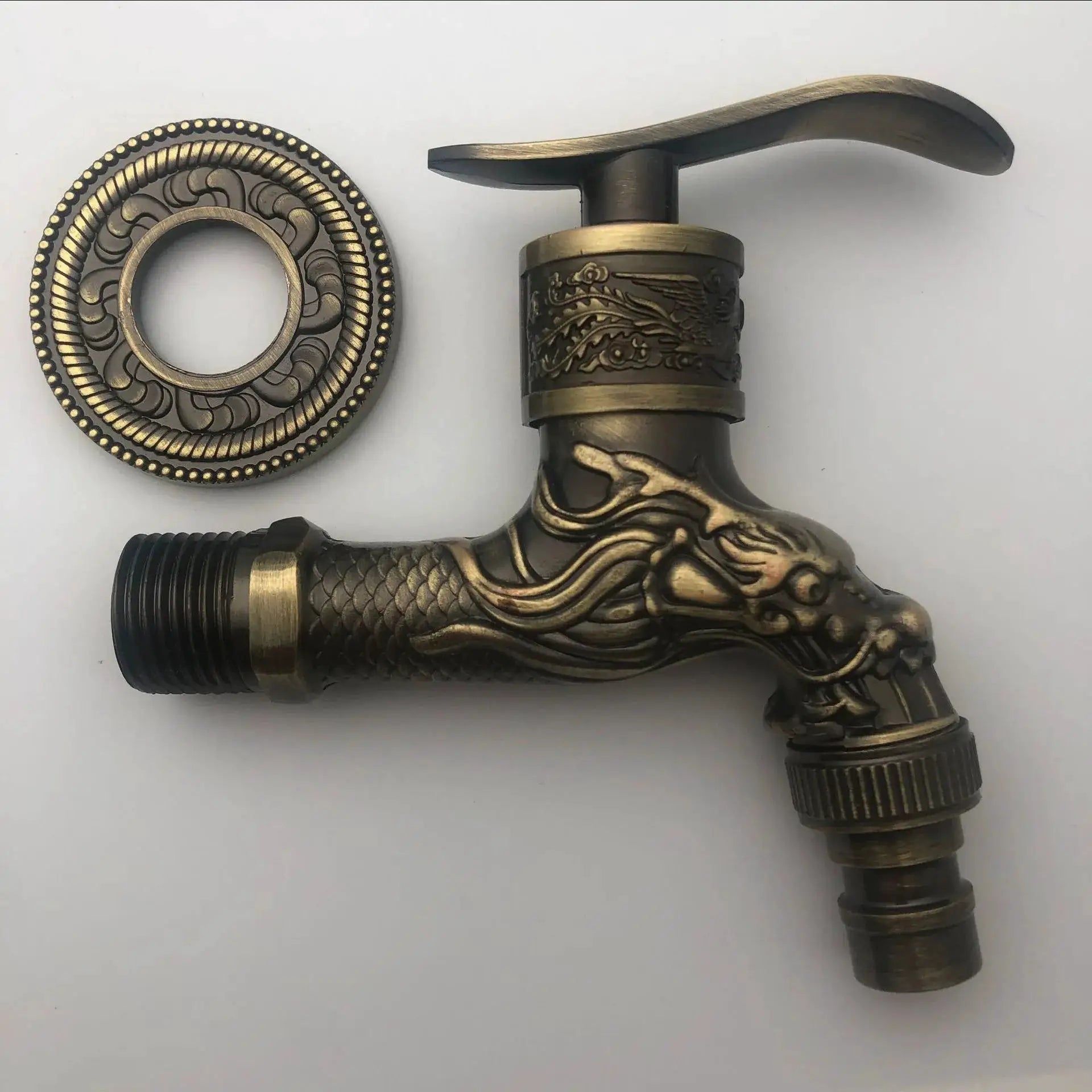 Antique bronze wall-mounted outdoor faucet with dragon relief carving and circular escutcheon, hose-thread outlet