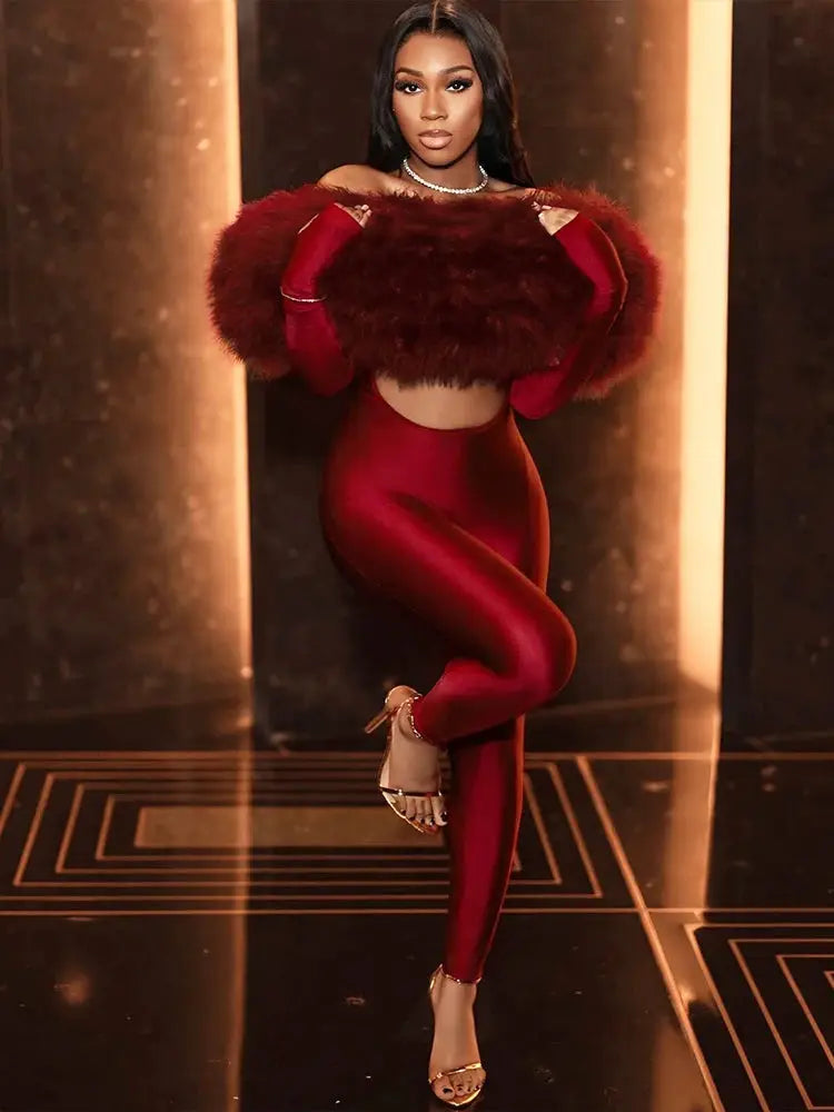 Sisterlinda furry neck jumpsuit in burgundy metallic stretch fabric