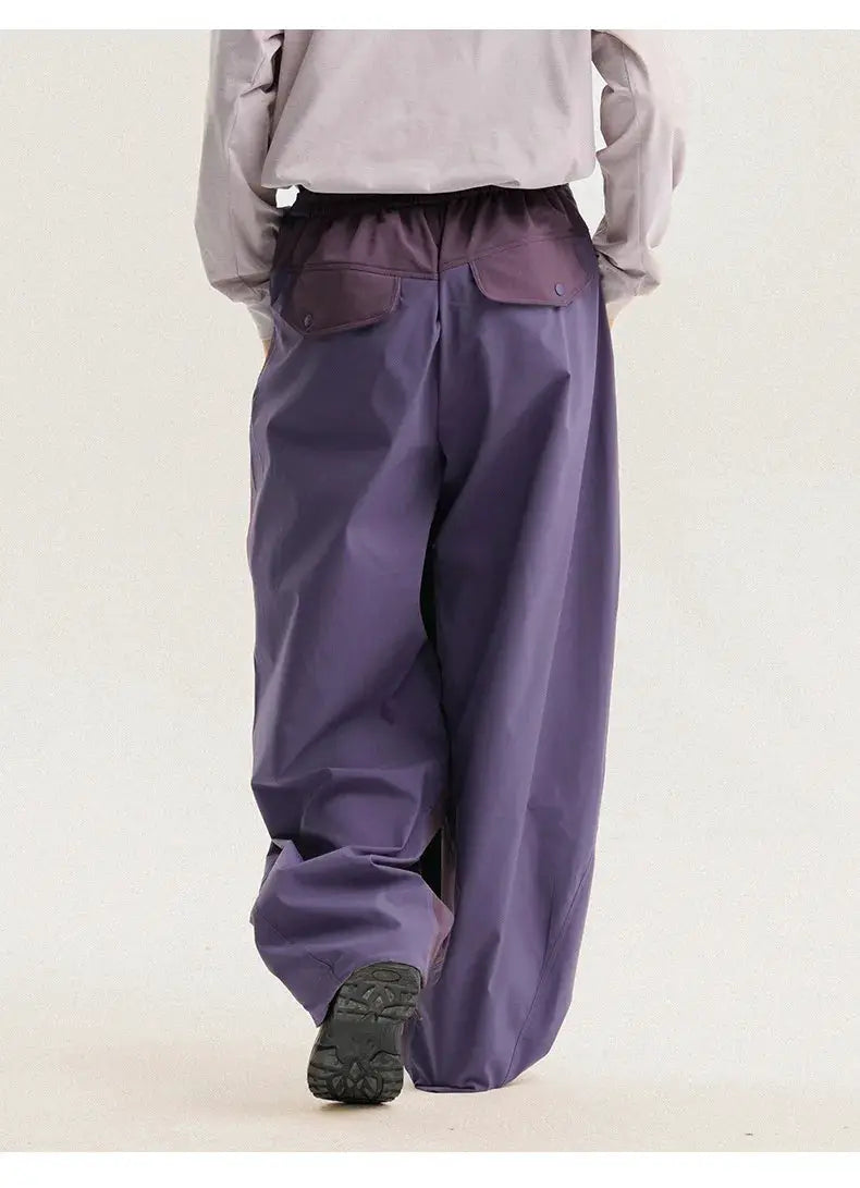 Men's cargo pants by Simples Market; purple ultra-loose wide-leg with back flap pockets.
