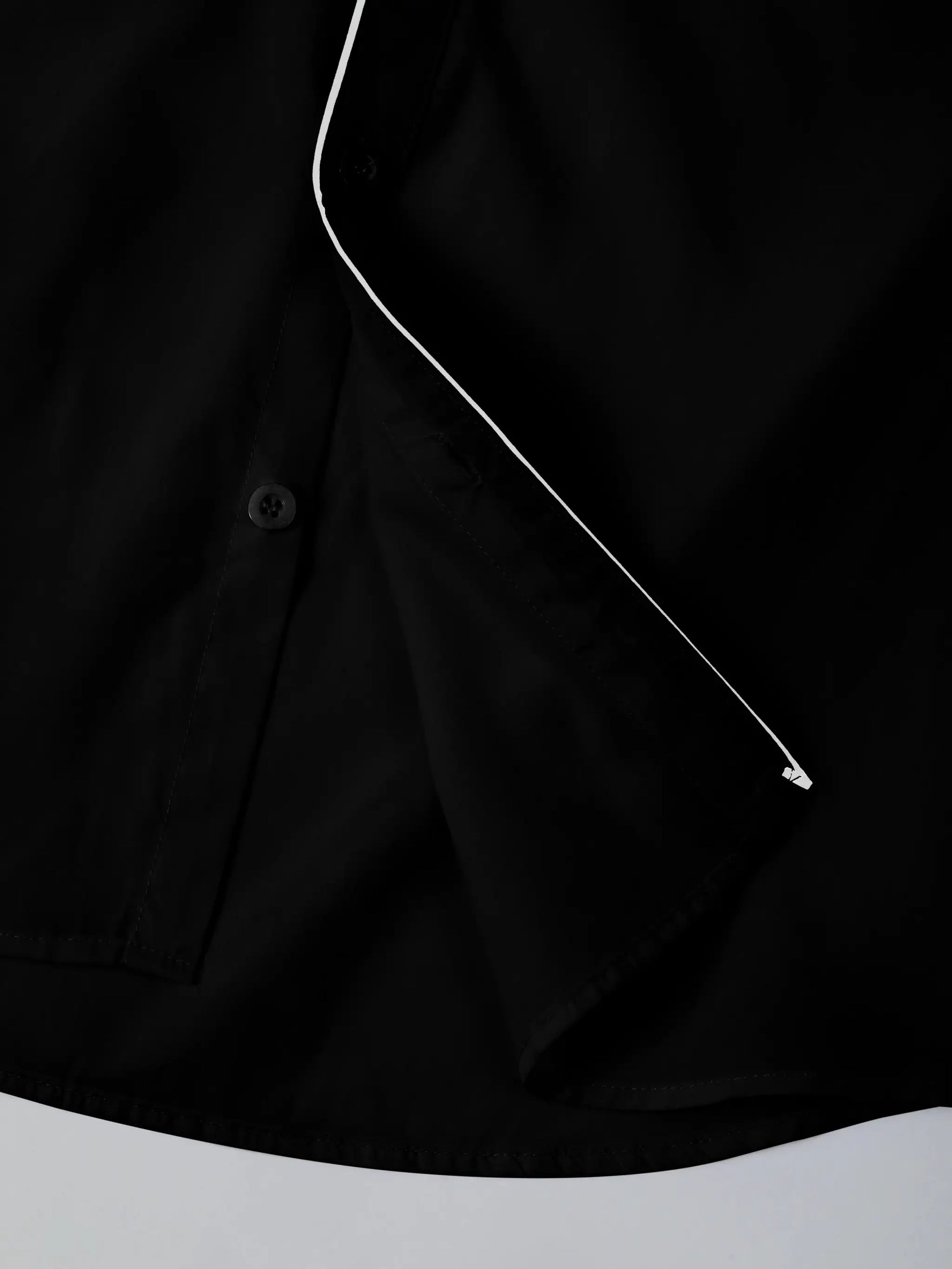 Men's black long-sleeve button-down shirt with white piping and stand-up collar