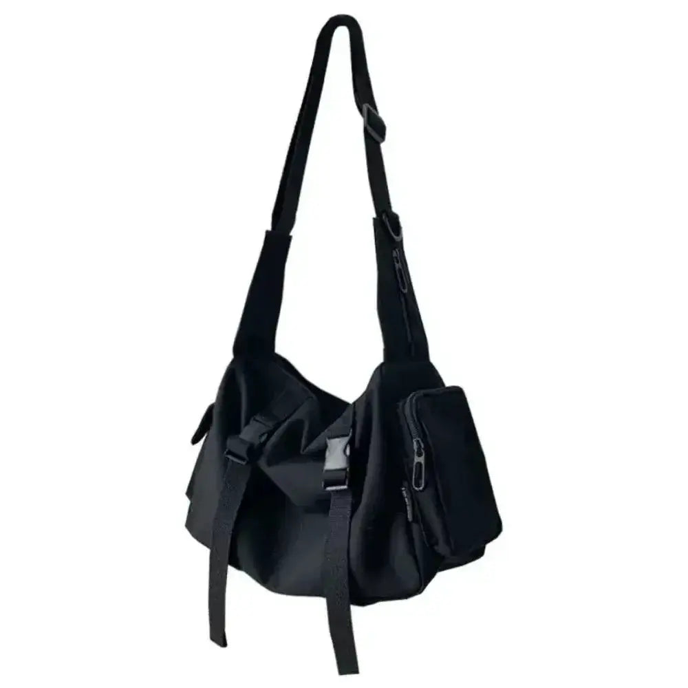 Black canvas crossbody bag with large capacity, multiple zip pockets and an adjustable strap