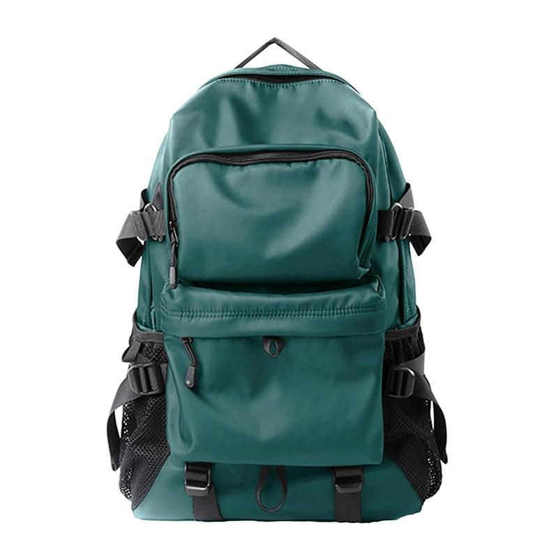 ZUOKEDISI 15.6-inch laptop travel backpack in teal with multiple pockets