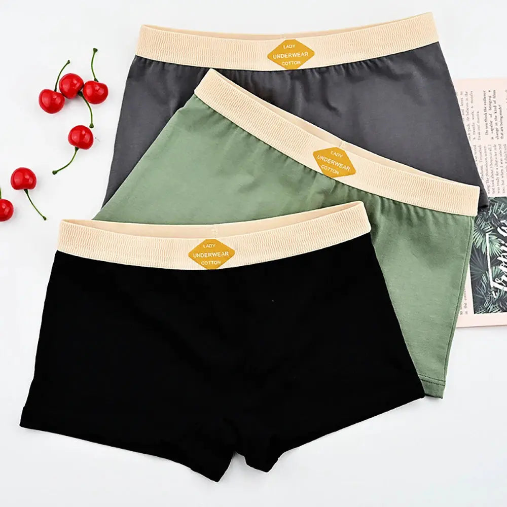 Simples Market 3-pack cotton women's boxer briefs in black, olive green, and gray with beige elastic waistband.