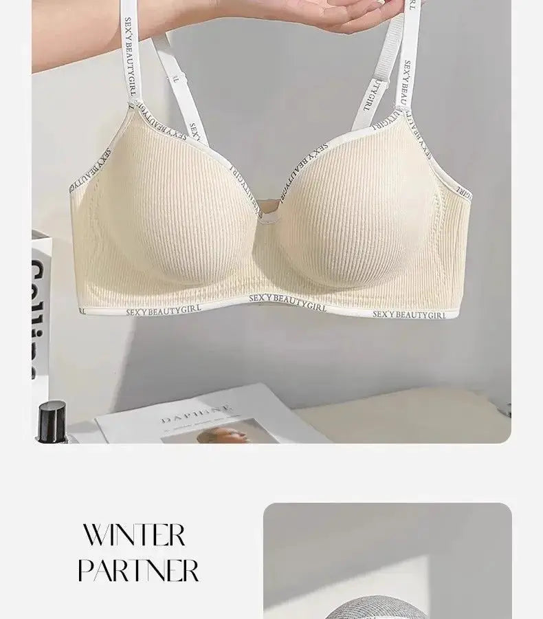 Push-up wireless beige bra with ribbed cups and adjustable white straps