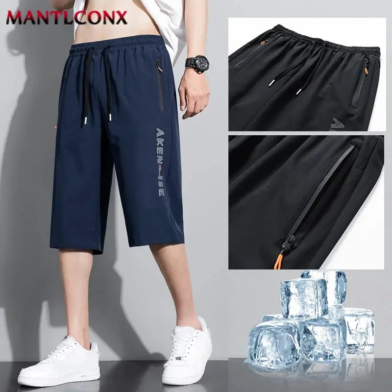 Men's athletic shorts by MANTLCONX, navy color, elastic waist, quick-dry fabric, zip pocket