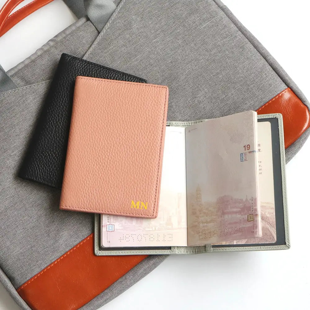 Peach and black leather passport cover set with two card holders, monogram MN