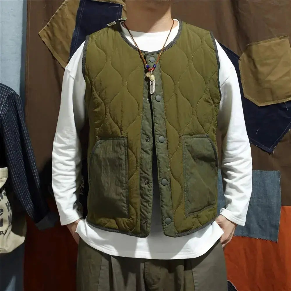 Simples Market vintage cotton padded vest; olive green quilted sleeveless jacket with front pockets.