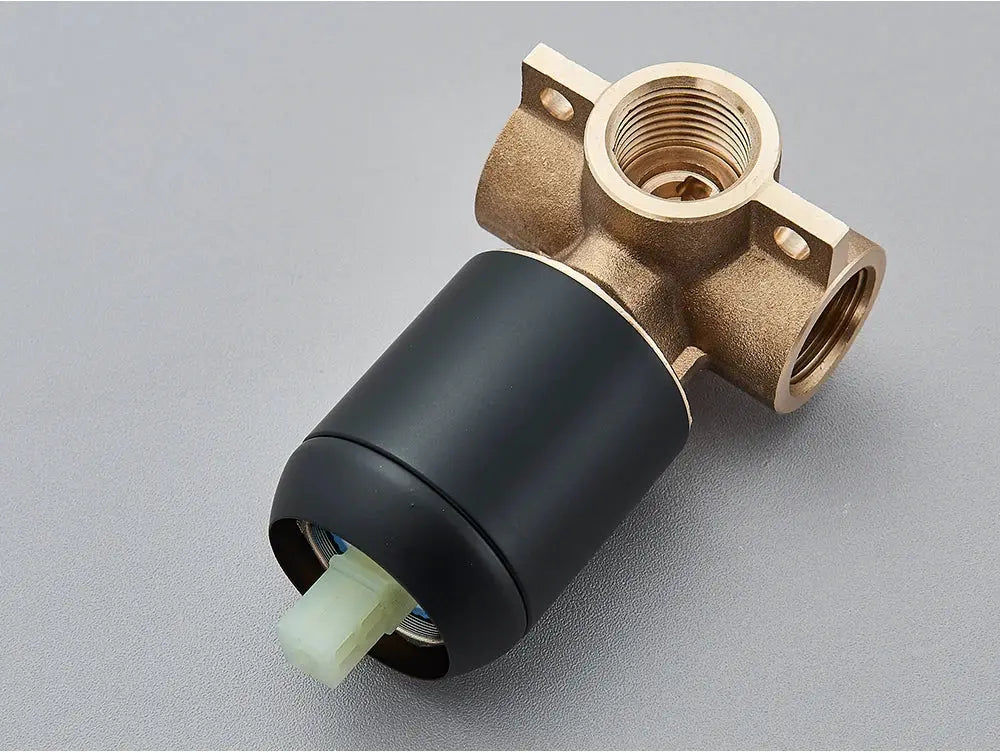 Brass bathroom mixer valve with black actuator and shower diverter by Simples Market
