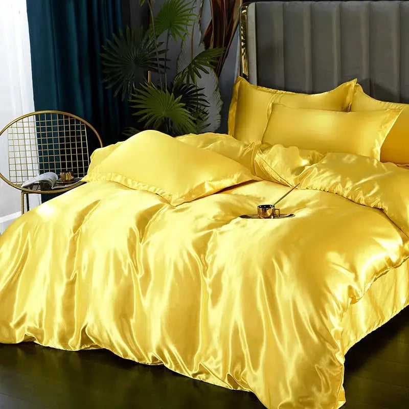 Simples Market silk satin bedding set in solid yellow; includes duvet cover, bed sheet, and pillowcases.