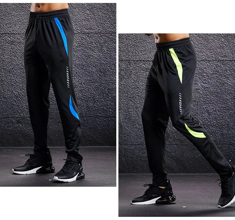 Men's sport pants with zip pockets; black joggers with blue or neon lime side panels.