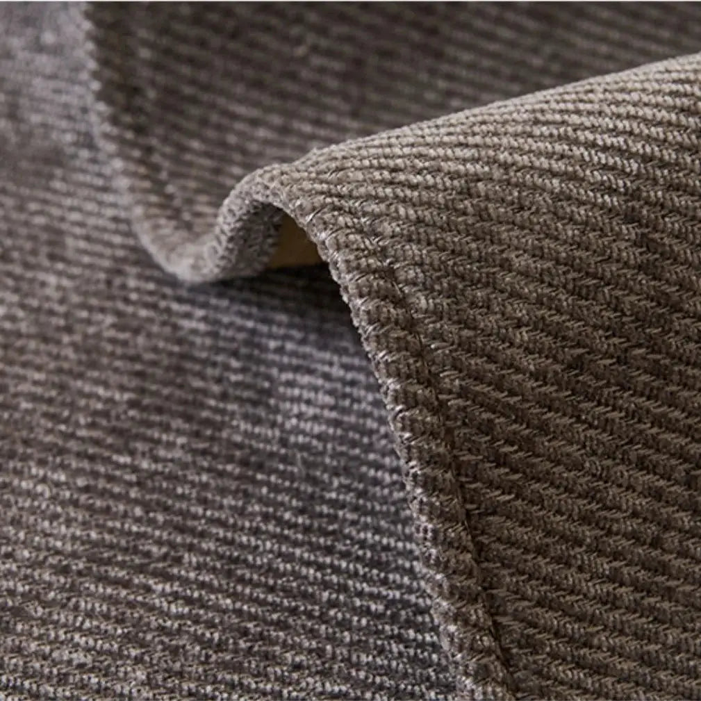 Sofa slipcover in taupe twill chenille with anti-slip grip.