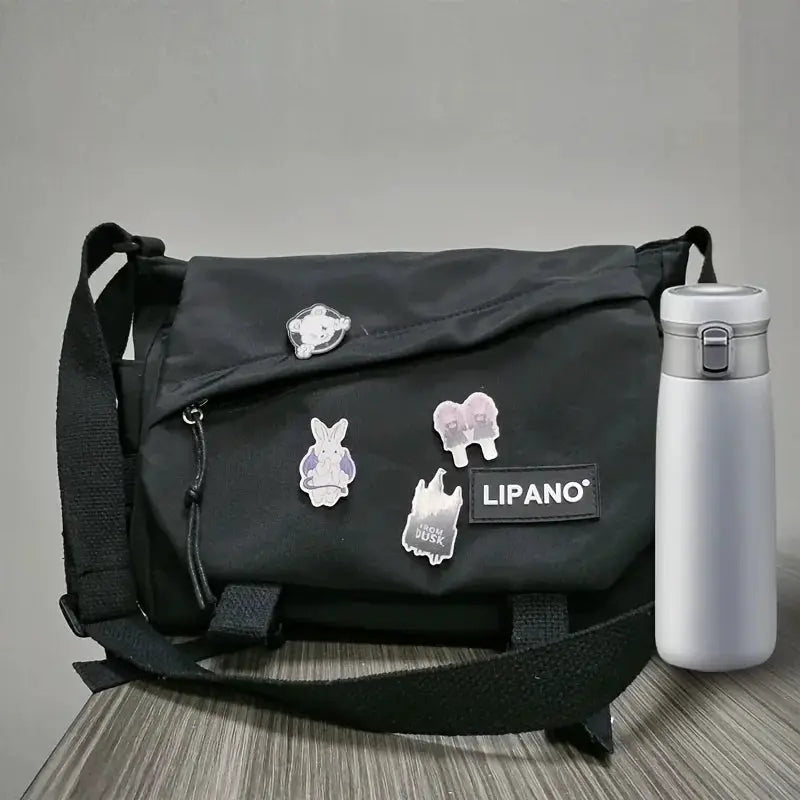 Men's nylon crossbody bag, large-capacity black messenger style with Lipano patch
