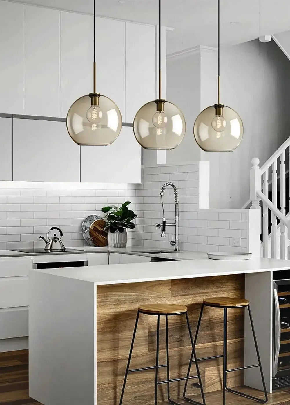 Nordic LED glass chandelier, three amber glass pendant lights over a white kitchen island.
