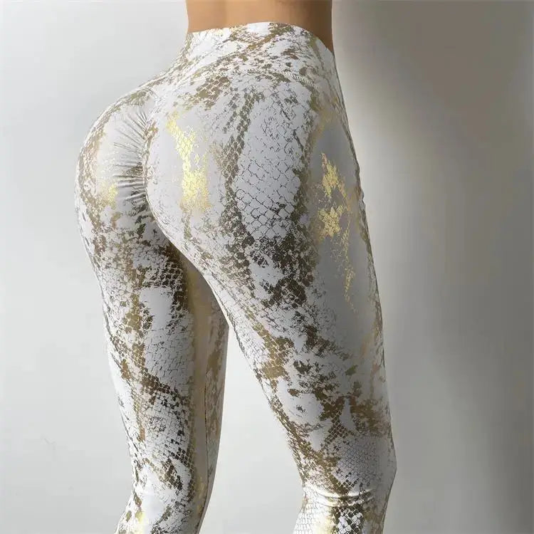 Snake-print yoga pants by Simples Market, high-waist stretchy leggings in white and gold for women