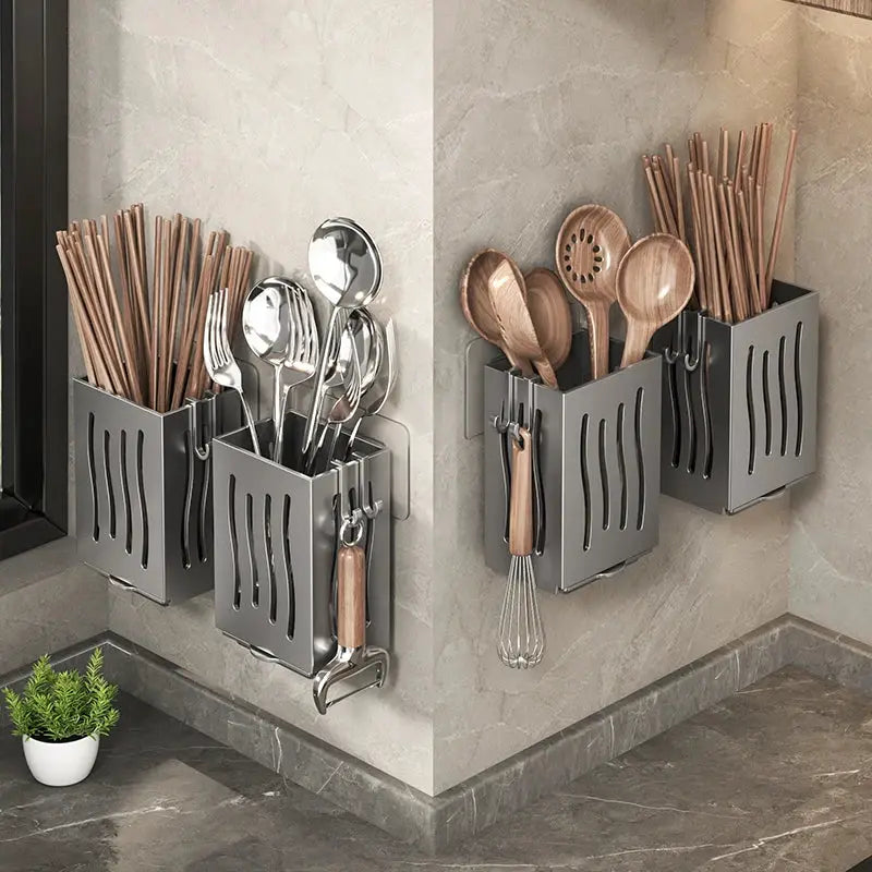 Chopstick and utensil storage boxes, two wall-mounted gray metal units with drainage slots.