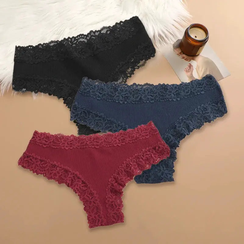 3-piece set of women's cotton lace-trim panties in black, navy, and burgundy
