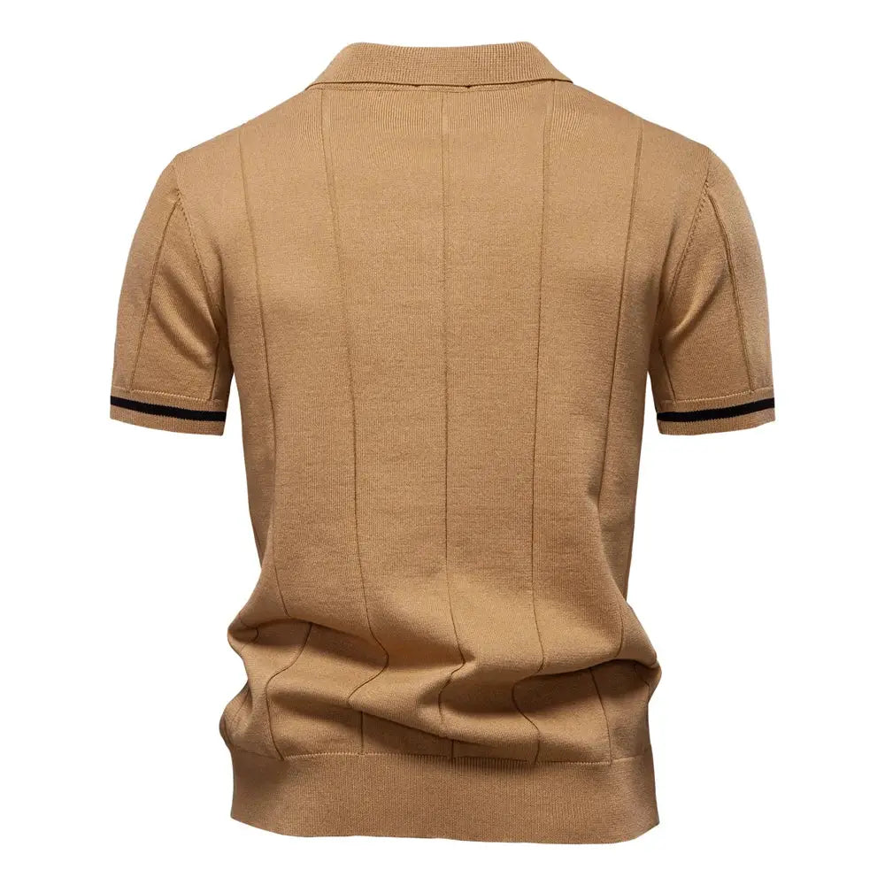 Men's tan solid color polo shirt with short sleeves and black striped cuffs, back view
