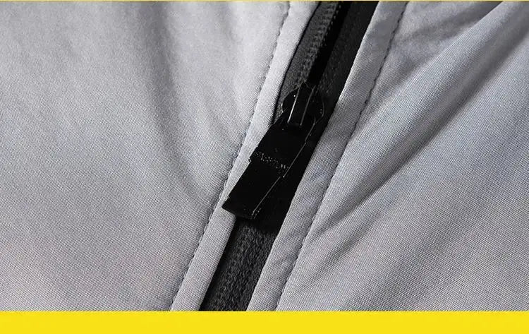 Men's lightweight windbreaker jacket in light gray with a black zipper.
