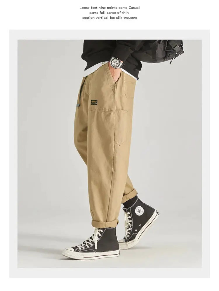 HIQOR men's tan cargo pants with multiple pockets, baggy fit and rolled cuffs for streetwear style